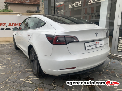Tesla Model 3 — 3