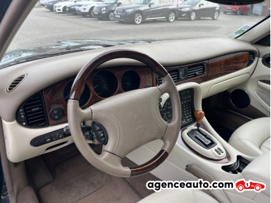 Jaguar XJ — 12