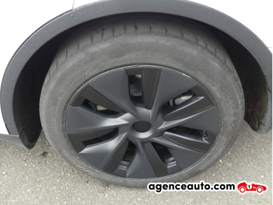 Tesla Model Y — 25
