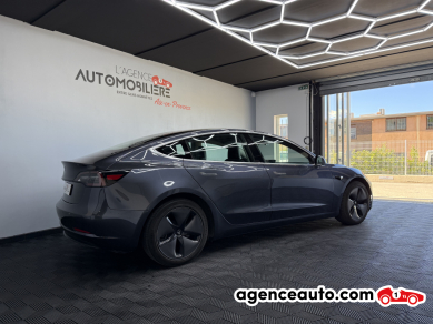 Tesla Model 3 — 3