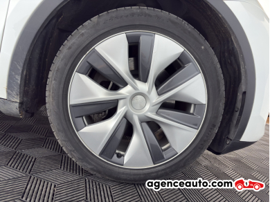 Tesla Model Y — 24