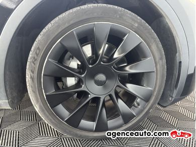 Tesla Model Y — 25