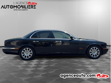 Jaguar XJ — 6