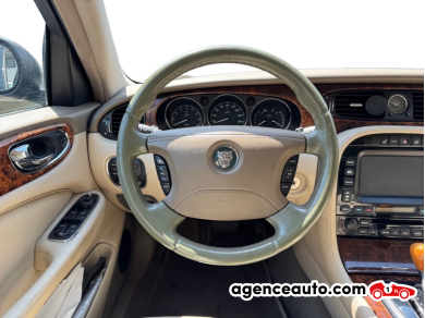 Jaguar XJ — 12