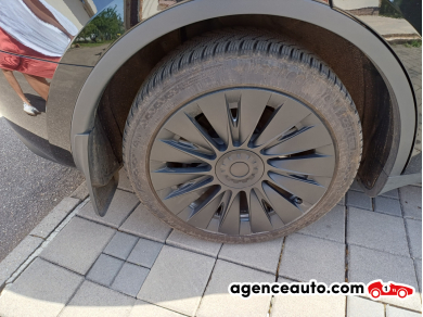 Tesla Model Y — 24
